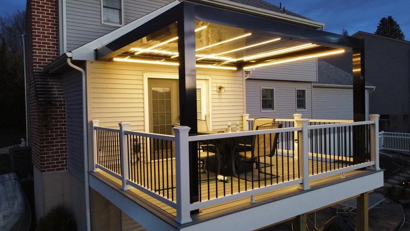 Louvered pergola with integrated linear lighting at night