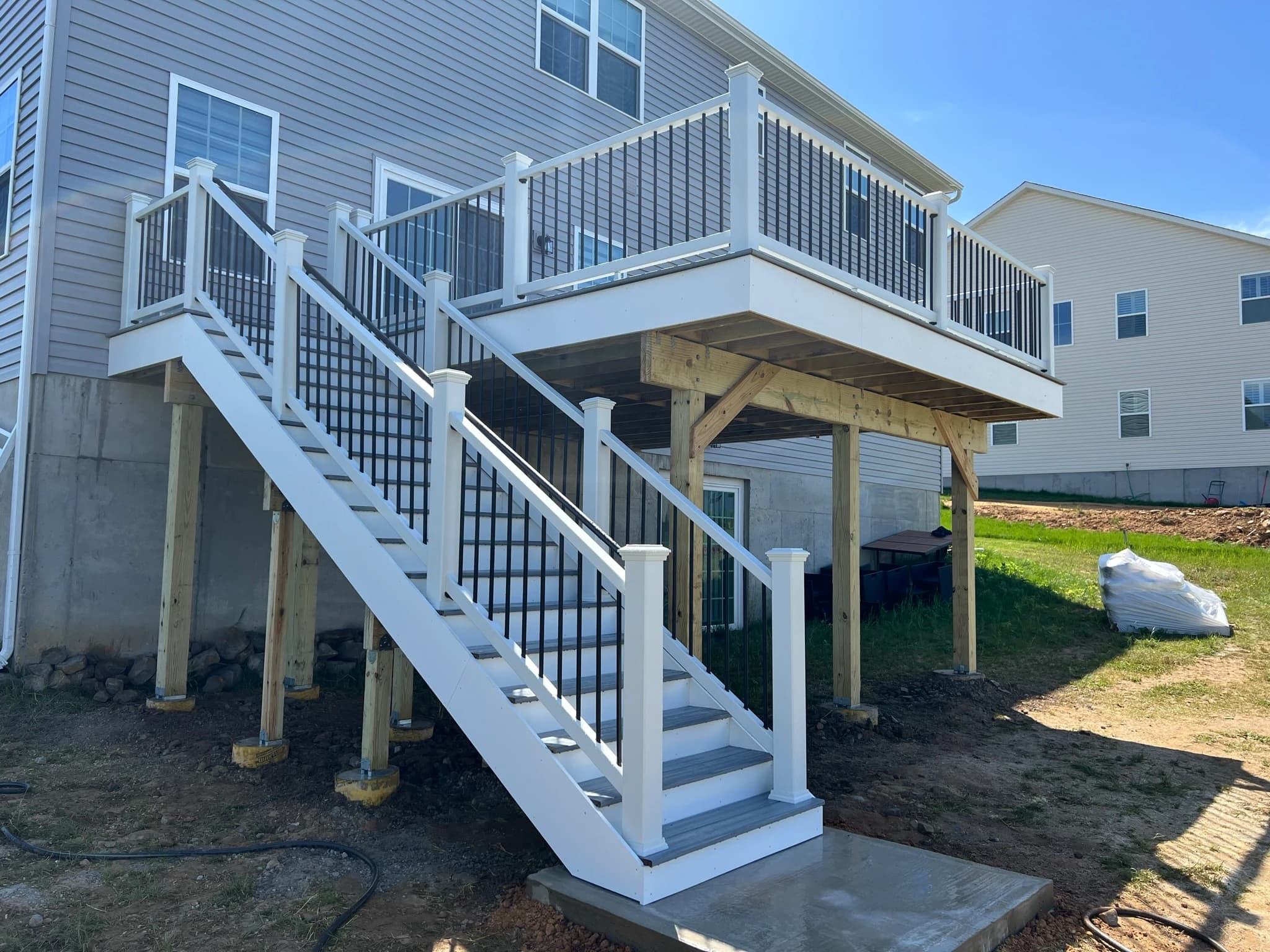 Stair, concrete landing and supporting posts.