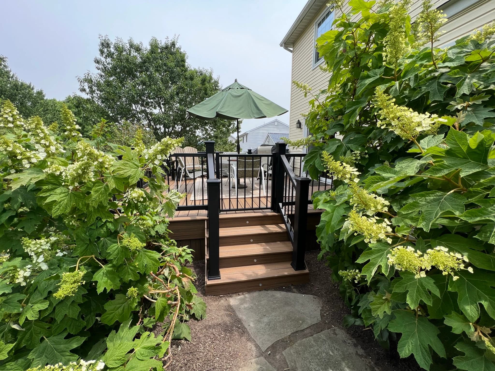 Garden Deck with Dark Railings - Image 1
